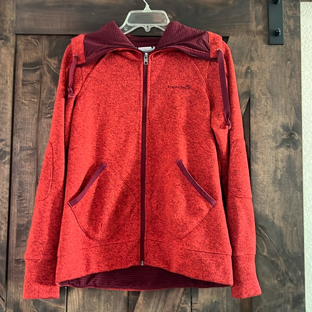 Red zip up jacket